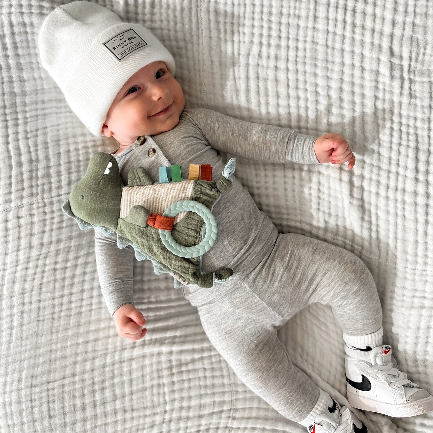 Bitzy Crinkle™ Dino Sensory Toy with Teether - The Brass Bee